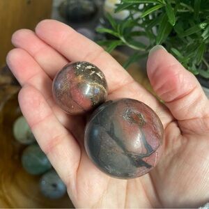 Elegant Spheres in Red and Brown Rhodonite crystal sphere set